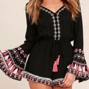 Lulu’s black romper with tassels